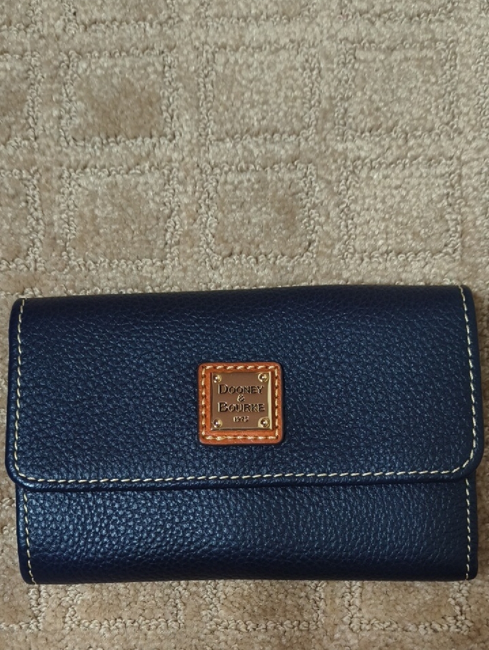 Dooney & Bourke Navy Pebbled Leather Continental Wallet with Gold Logo